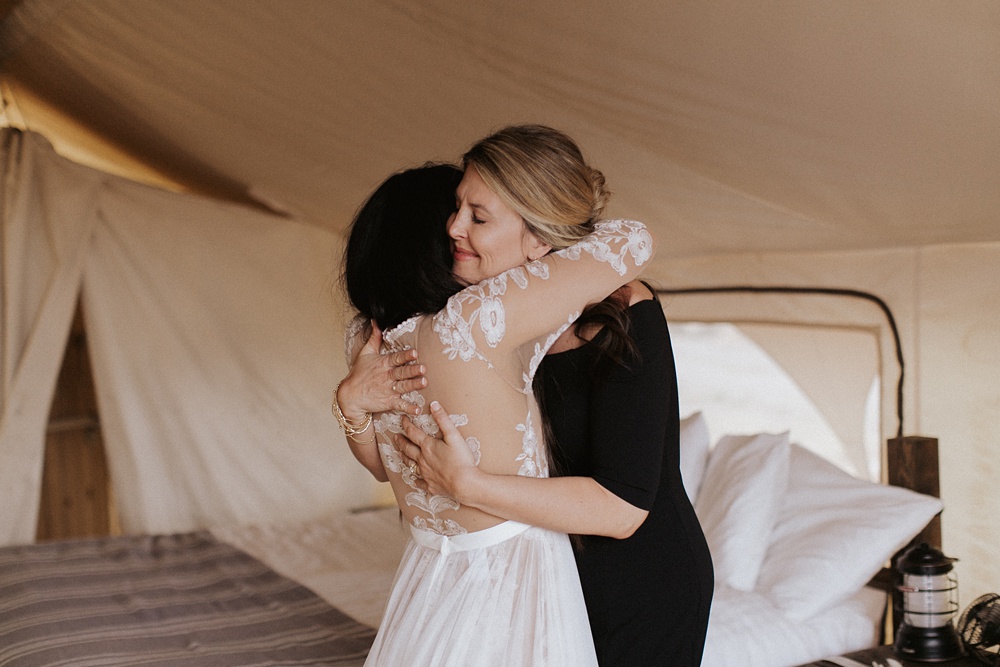Charlotte Wedding Photography | Bride hugging Mom
